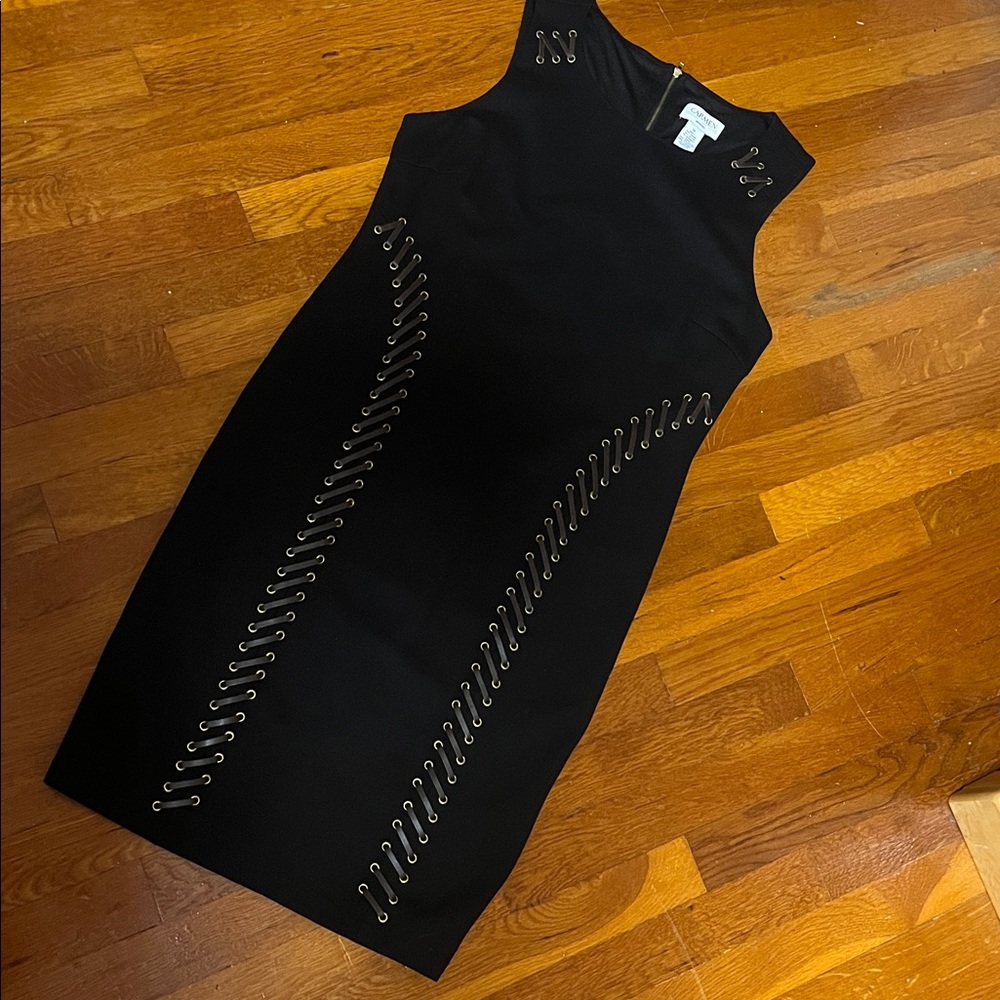 Carmen Marc Valvo Black Dress with Eyelet Accents size 10 no tags. Not worn